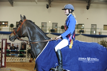 Buckinghamshire Showjumper Chantal de Verteuil takes two championship titles at the Blue Chip Showjumping Winter Championships